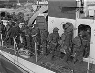 Personnel of the North Nova Scotia Highlanders boarding an LCI(L) of the 2nd Canadian (262nd RN) Flotilla during pre-invasion exercise ca. May 1944