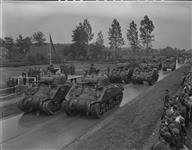 Review and March Past of 5th Canadian Armed Division - Salute taken by General Crerar 23 May 1945