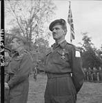 Brigadier John M. Rockingham after being invested with the D.S.O. by H.M. King George VI 13 Ot 1944