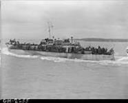 LCI(L) 118 of the 2nd Canadian (262nd RN) Flotilla carrying personnel of the 9th Canadian Infantry Brigade en route to France on D-Day 6 June 1944
