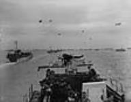View from LCI(L) 306 of the 2nd Canadian (262nd RN) Flotilla showing ships of Force 'J' en route to France on D-Day 6 June 1944
