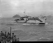 LCI(L) 299 of the 2nd Canadian (262nd RN) Flotilla carrying personnel of the 9th Canadian Infantry Brigade en route to France on D-Day 6 June 1944
