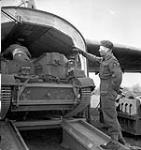 Bren Gun Carrier of the 6th British Airborne Division being loaded into General Aircraft 'Hamilcar' i glider of the R.A.F. in preparation for Operation 'Varsity' (Rhine Drop), England, 18 Mar 1945 18 MAR 1945