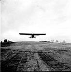 Taylorcraft Auster A.O.P III aircraft of the R.A.F taking off an artillery observation flight in support of the 17th Field Regiment, R.C.A. Castel Fentano, Italy, 10 Feb 1944 10 FEB 1944