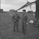 Gen. H.D.G. Crerar visiting Maj.-Gen. H.W. Foster, 1st Canadian Infantry Division, at his headquarters during push on Apeldoorn. Teuge (vic.), Netherlands, 14 April 1945 14 Apr. 1945