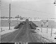 View across bailey bridge 'Yardley' installed by the Royal Canadian Engineers (RCE) over River Maas. Ravenstein, Netherlands, 1 Feb. 1945 1 FEB. 1945