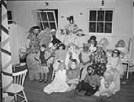 Children in Hallowe'en costumes, Ward J of Children's Memorial Hospital 31 Oct. 1939