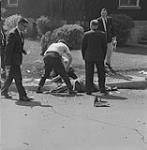 Sgt. Major Walter Lega injured in bomb explosion. Montreal, Que., 1963/05/17 17 May 1963