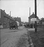 Vehicles pass Netherlands frontier, 2 C.I.D. Calgary Highlanders 6 Oct. 1944
