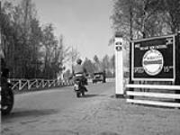 Entrance gate sign at No.1 Canadian Field Punishment Camp (Canadian Army Miscellaneous Units), Vught, Netherlands, ca. 21-23 April 1945 [ca. April 21-23, 1945].