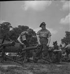 Personnel of the Cameron Highlanders of Ottawa servicing machine guns 28 May 1943