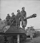 Personnel with 'Firefly' tank 'Adanac' of the Fort Garry Horse, the only D-Day tank still serving with the regiment.(L-R): Sgt. H.W. Strawn, Cpl. J.E. Stephenson, Tpr. C.F. Spence, Cpl. L.E. Smith 6 Ot. 1944