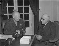 Meeting of General Dwight Eisenhower (left) and Col. the Hon. J.L. Ralston at SHAEF Headquarters 12 Ot. 1944
