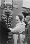 Rt. Hon. Jules Léger (left) shaking hands with Bonhomme Carnaval from Quebec City during a visit to the 'Réalités Canadiennes' exhibition. Paris, France, 25 Jan 1967 25 January 1967