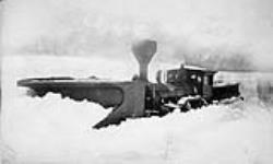 Grand Trunk Railway. Engine and snowplough near Black River Station