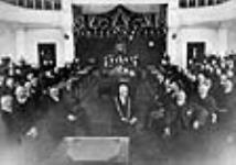 Opening session of the House of Commons at the Victoria Memorial Museum after the Parliament Buildings fire of 1916 18 Mar. 1918