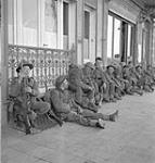 Infantrymen of The Royal Regiment of Canada resting after a long march, Blankenberghe, Belgium, 11 September 1944 September 11, 1944.