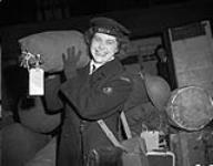 Leading Wren June Whiting, Women's Royal Canadian Naval Service (W.R.C.N.S,), disembarking at Liverpool, England, April 1945 April 1945.