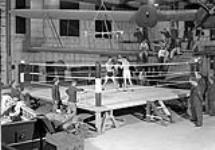 Boxing match in No.1 Hangar, Royal Canadian Air Force Station Coal Harbour, British Columbia, Canada, 15 May 1942 May 15, 1942.