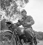 Despatch rider Frank Shaughnessy of the 2nd Anti-Tank Regiment, Royal Canadian Artillery (R.C.A.) July 1943