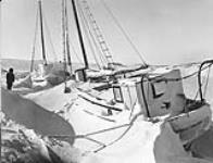 [Two schooners belonging to Inuk man Angulalik, a trader at Perry River] Original title: The occasional Eskimo owns his own schooner. These two belong to Angulalik, native trader at Perry River 1949.