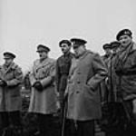 Rt. Hon. Winston Churchill overlooking the Rhine River, accompanied by Gen. H.D.G. Crerar, Lt. Gen. G.G. Simonds and Field Marshal Sir Alan Brooke on the left and Field Marshal Sir Bernard Montgomery on the right 4 Mar. 1945