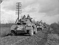 General Motors T17E1 Staghound armoured cars of "A" Squadron, 12th Manitoba Dragoons, in the Hochwald, Germany, 2 March 1945 Marh 2, 1945.