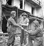 Personnel of the Royal Canadian Engineers (R.C.E.) placing demolition charges, Caen, France, 10 July 1944 July 10, 1944.