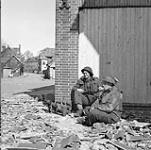 Lance-Corporal A. Kerelchuk and Private H.M. Sigurdson, both of The Argyll and Sutherland Highlanders of Canada, guarding the northern approach to a bridge across the Hase River, Meppen, Germany, 8 April 1945 April 8, 1945.