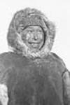 Smiling Inuit man in a caribou parka 1947-1948.