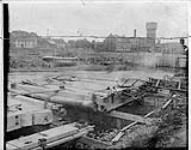 Upper gates of Lock 18 of the Cornwall Canal under repair ca. July 1910.