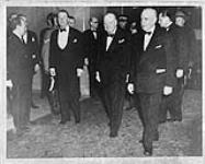 Dignitaries attending a dinner at the Chateau Laurier.(L-R at centre):Viscount Alexander of Tunis,Mr. W. Howard Measures (at rear),Rt.Hons.Winston Churchill,Louis St.Laurent 14 Jan 1952