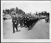 Personnel of the Royal Canadian Navy marching to Beacon Hill Park for the presentation of the King's Colour by King George VI 30 May 1939