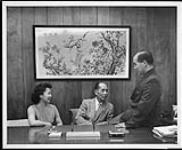 Chemist Anna Lee, president Ping Lee, and general manager Fred Lee, principals of the Windsor, Ont. based Oriental Commerce Ltd., which operates a frozen-food business specializing in Chinese food 1959