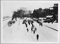 The Snow-Shoers' Church Parade starting from the Drill Hall, Cartier Square, during the Winter Sports carnival Feb. 1930
