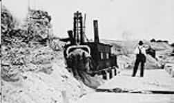 Steam shovel loading flatcars of the Toronto, Hamilton and Buffalo Railway Company n.d.