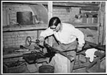 Glassblower Luigi Tedesco at work in his factory 1962-1971