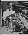 Fernando Pierbattista in his barbershop ca. 1960's