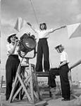 Unidentified signallers of the Women's Royal Canadian Naval Service (W.R.C.N.S.) at the signal training school H.M.C.S. ST HYACINTHE, St. Hyacinthe, Québec, Canada, September 1944 September, 1944