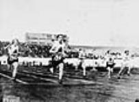 Ethel Smith (left) and Fanny Rosenfeld (second from left) of Canada, perhaps at semi-final in the women's 100 meters at the VIIIth Summer Olympic Games 1928