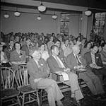 1st Conference of Canadian Artists at Queen's University. Front row, from left to right: André Biéler, Michael Forster, A.Y. Jackson, Lowrie Warrener. 2nd row: Alma Duncan (white dress) and Tom Stone. 3rd row: Miller Brittain, Walter Abell June 1941