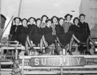 Members of the Women's Royal Canadian Naval Service (W.R.C.N.S.) aboard H.M.C.S. SUDBURY celebrating the first anniversary of the formation of the W.R.C.N.S.. Halifax, Nova Scotia, Canada, 19 August 1943 August 19, 1943