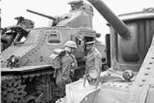 Major-General E.W. Sansom inspecting the Ram Mark I tanks of the British Columbia Dragoons, Headley Down, England, 12 March 1942 Marh 12, 1942