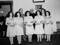 The Dionne quintuplets, accompanied by Mrs Olive Dionne and Frère Gustave Sauvé, take part in a program of religious music at Lansdowne Park, during the five day Marian Congress which prayed for peace and celebrated the centenary of the Ottawa archdiocese 18 - 22 juin 1947