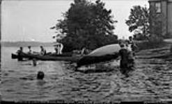 After the "Four in Canoe Hand Paddling Race", Morning House Regatta, Muskoka Lakes 10 Aug. 1907