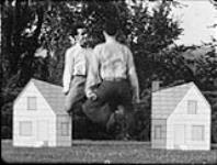 NFB Production "The Neighbours", short film of Norman McLaren - frame by frame animation of humans, simple parade about two people who come to blows over the possession of a flower 1952
