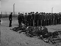 Roll call of Russian inmates of a German prisoner-of-war camp liberated by the 4th Canadian Armoured Division 12 Apr. 1945