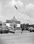 Second Canadian Corps - General Simonds taking the salute at the flag base 31 May 1945