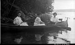 Unidentified group of women in rowboat ca. 1908