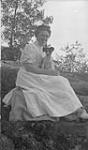 Unidentified woman with dog ca. 1908